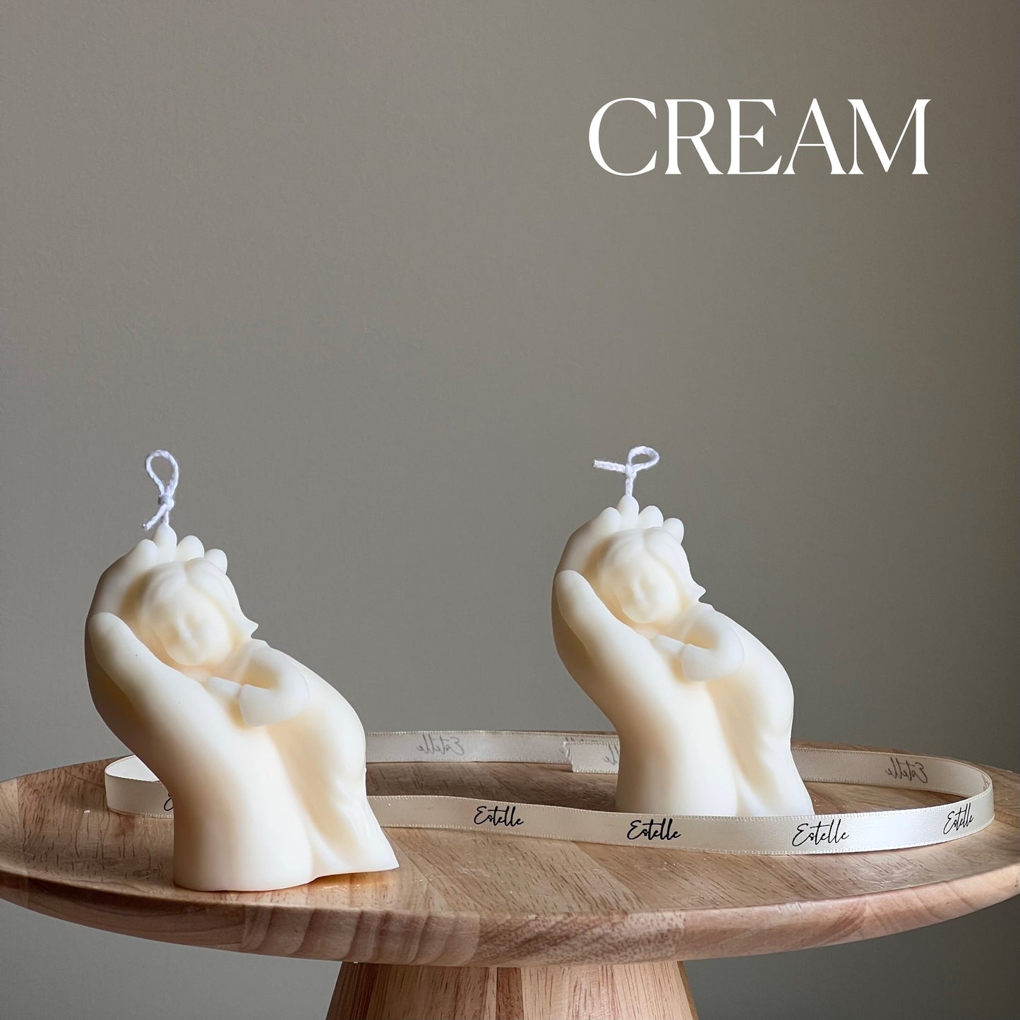 Baby In Hand Candle